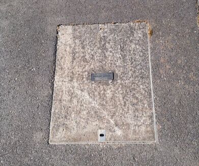 A Virgin Media Manhole Cover, for access to their internet coaxial cables.